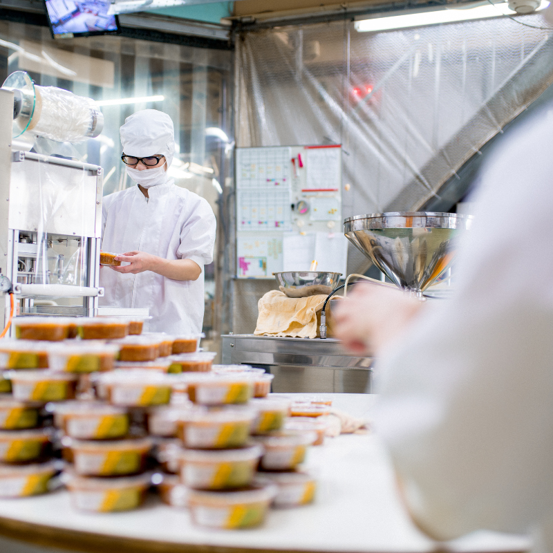 workers in a food production facility