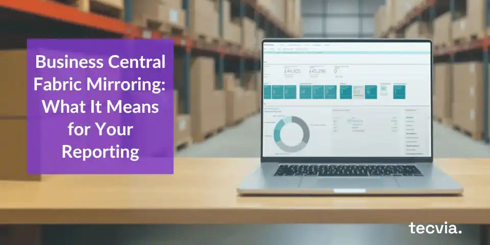 Business Central dashboard on a laptop in a warehouse, with the title Business Central Fabric Mirroring